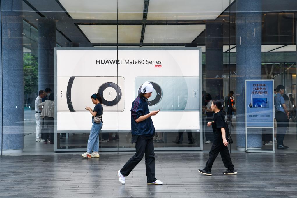 國(guó)產(chǎn)手機(jī)、新能源汽車走俏：中國(guó)制造“開(kāi)門紅”(圖1)